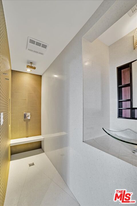 7044 Los Tilos Road Los Angeles, CA 90068 - Photo 44 of 58 a bathroom with a shower