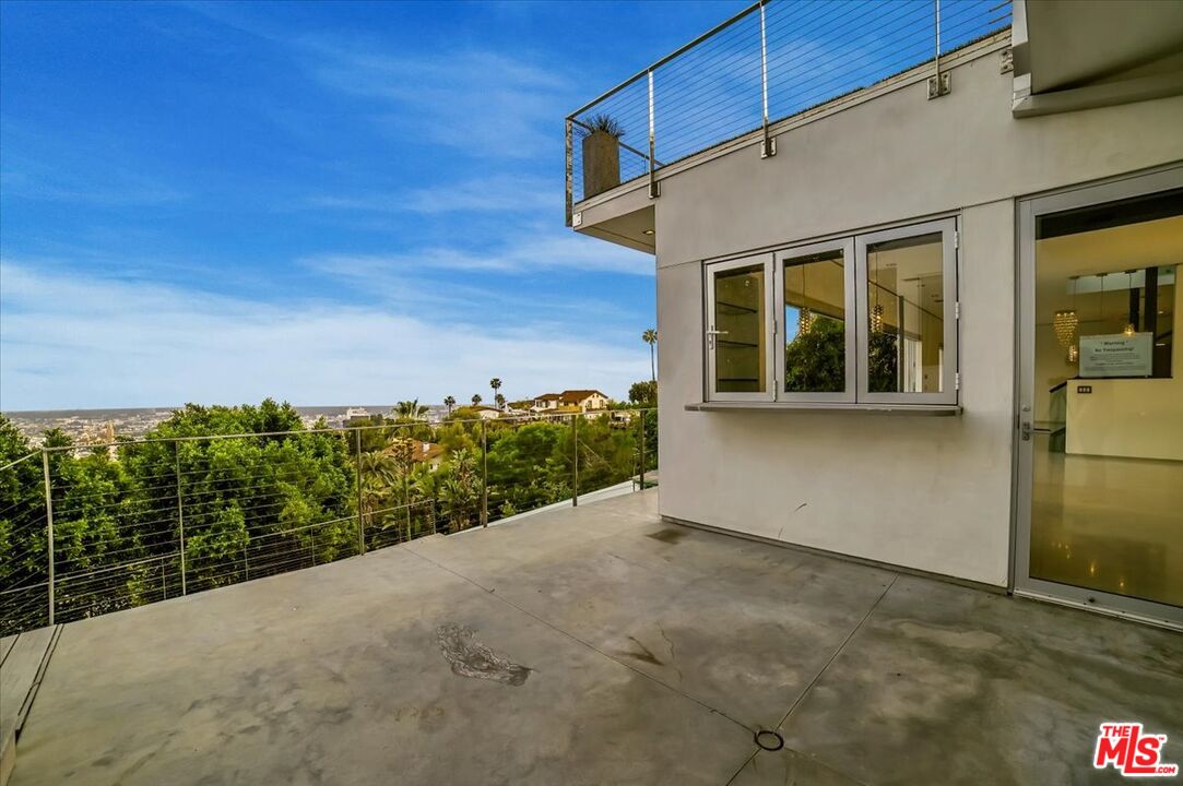 7044 Los Tilos Road Los Angeles, CA 90068 - Photo 46 of 58 a view of a house with a outdoor space