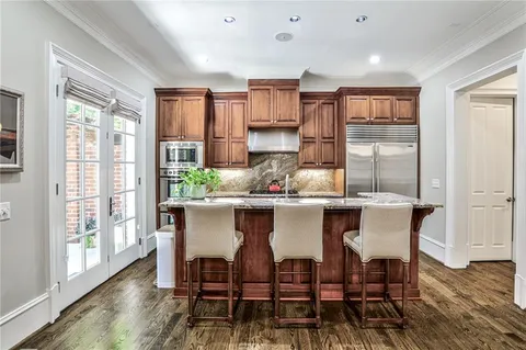 a dining room with furniture window wooden floor