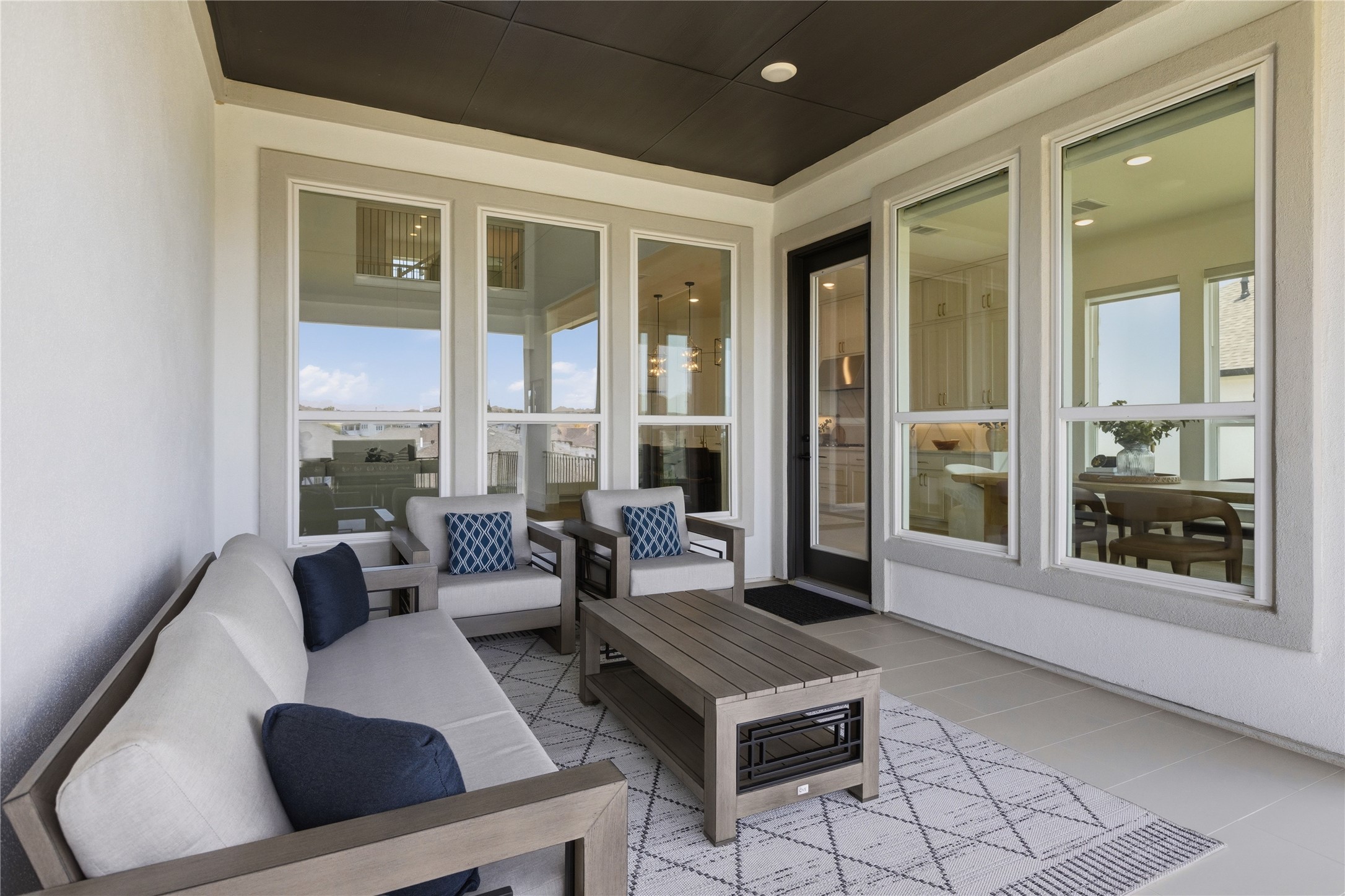 836 Villa Rialto View Leander, TX 78641 - Photo 33 of 33 An inviting covered patio extends living space, perfect for tranquil outdoor relaxation.