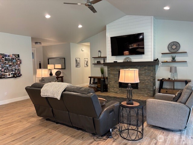 19443 Oakleaf Lane Sedro-Woolley, WA 98284 - Photo 11 of 39 a living room with furniture and a flat screen tv