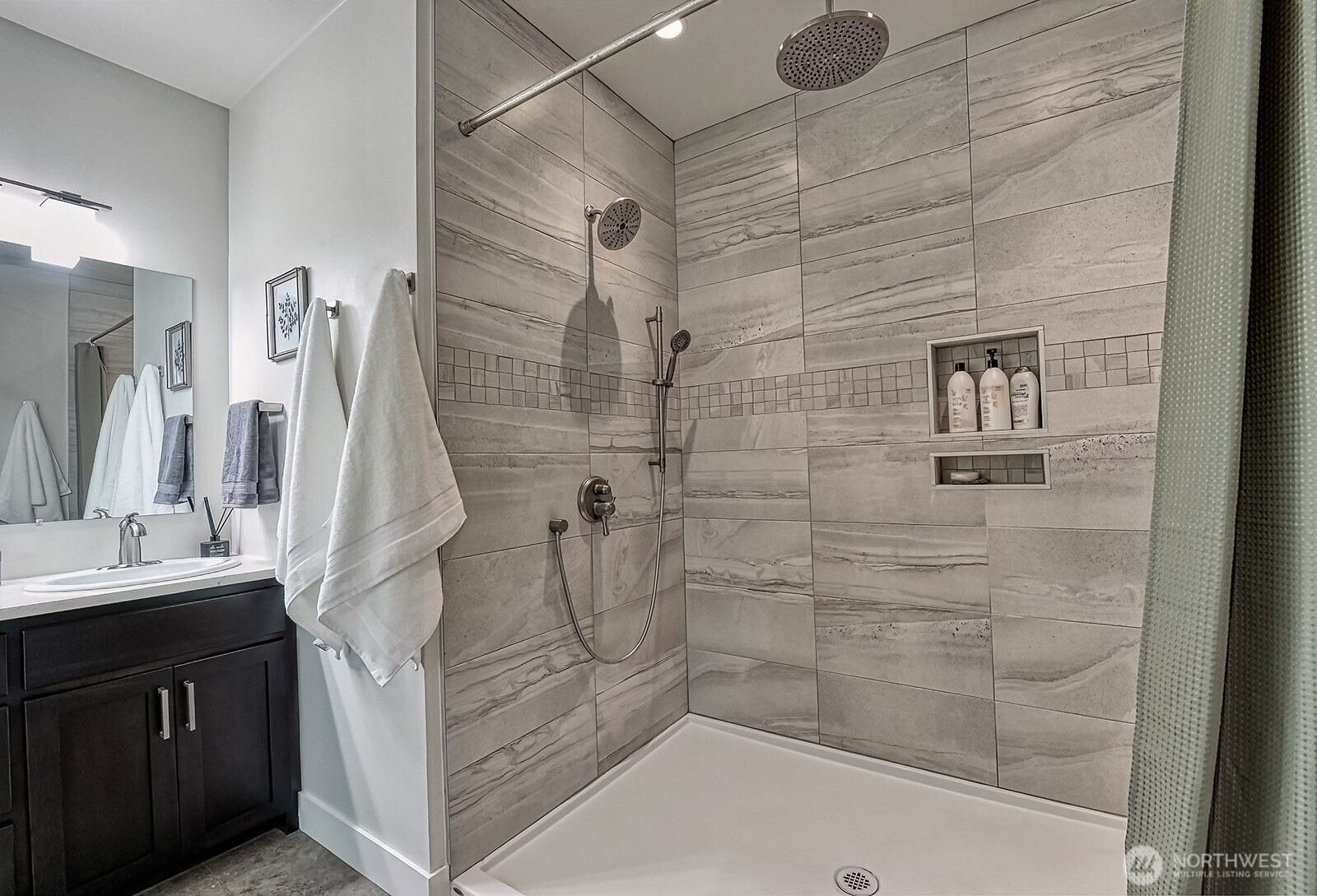 19443 Oakleaf Lane Sedro-Woolley, WA 98284 - Photo 18 of 40 a bathroom with a sink a mirror and shower