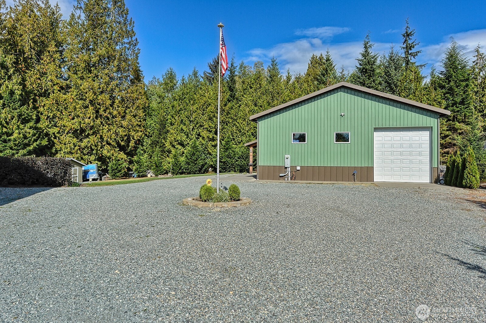19443 Oakleaf Lane Sedro-Woolley, WA 98284 - Photo 23 of 40 a view of a house with a yard and garage