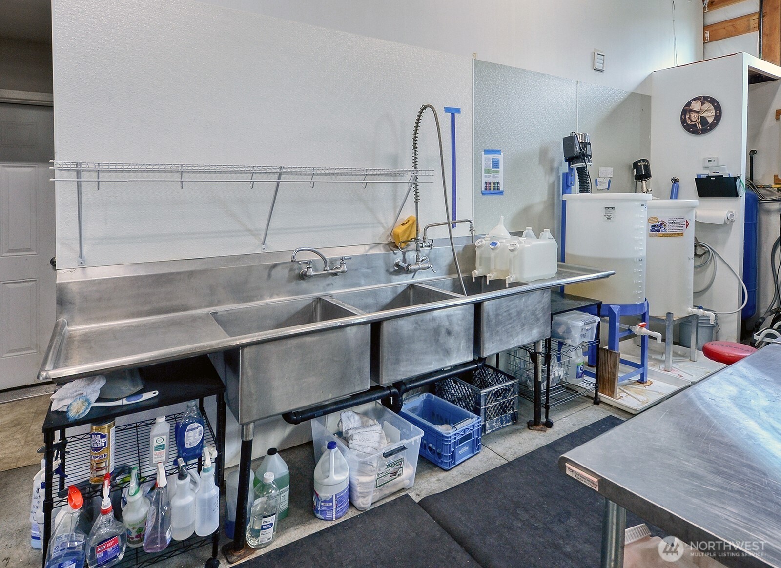 19443 Oakleaf Lane Sedro-Woolley, WA 98284 - Photo 28 of 40 a kitchen with stainless steel appliances a sink and cabinets