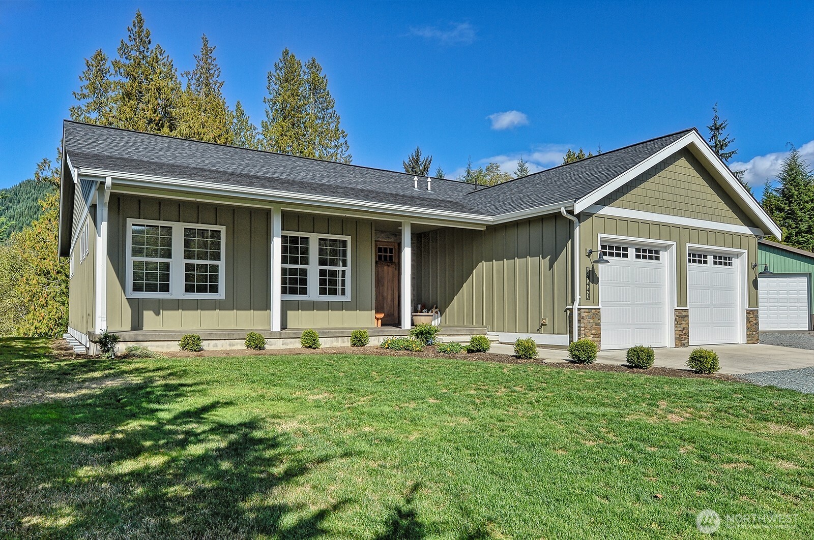 19443 Oakleaf Lane Sedro-Woolley, WA 98284 - Photo 3 of 40 a front view of a house with a yard