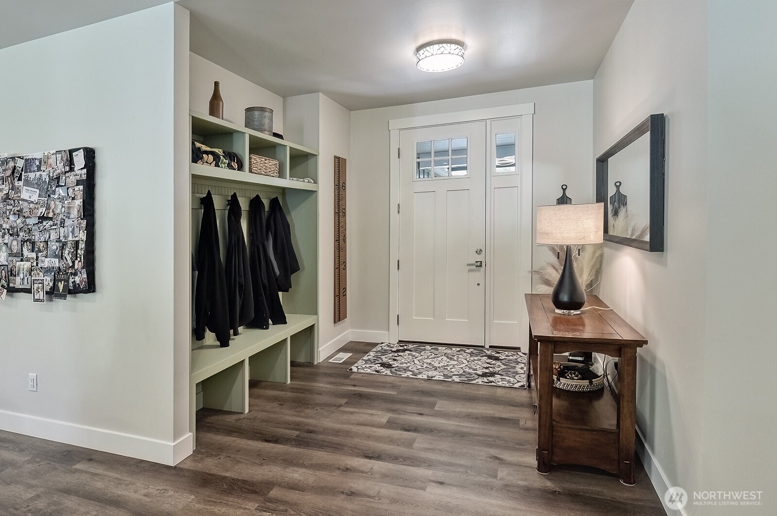 19443 Oakleaf Lane Sedro-Woolley, WA 98284 - Photo 6 of 40 a view of a hallway with wooden floor and workspace