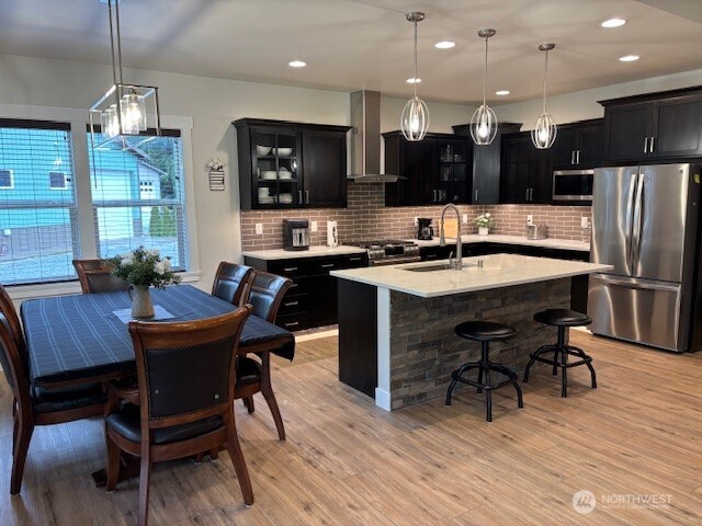 19443 Oakleaf Lane Sedro-Woolley, WA 98284 - Photo 7 of 39 a view of a dining room with furniture