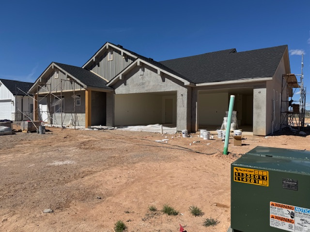 5005 North 75 East Enoch, UT 84721 - Photo 4 of 37 Property under construction with a shingled roof and board and batten siding