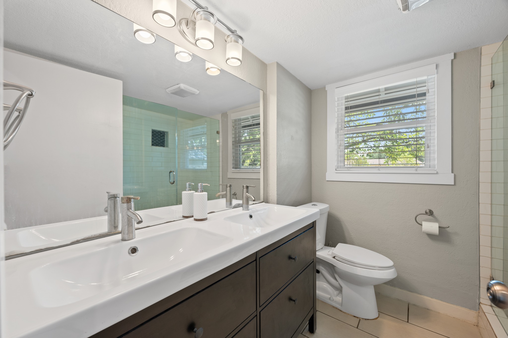 1801 Ohlen Road Austin, TX 78757 - Photo 31 of 32 Actual downstairs bathroom photo.