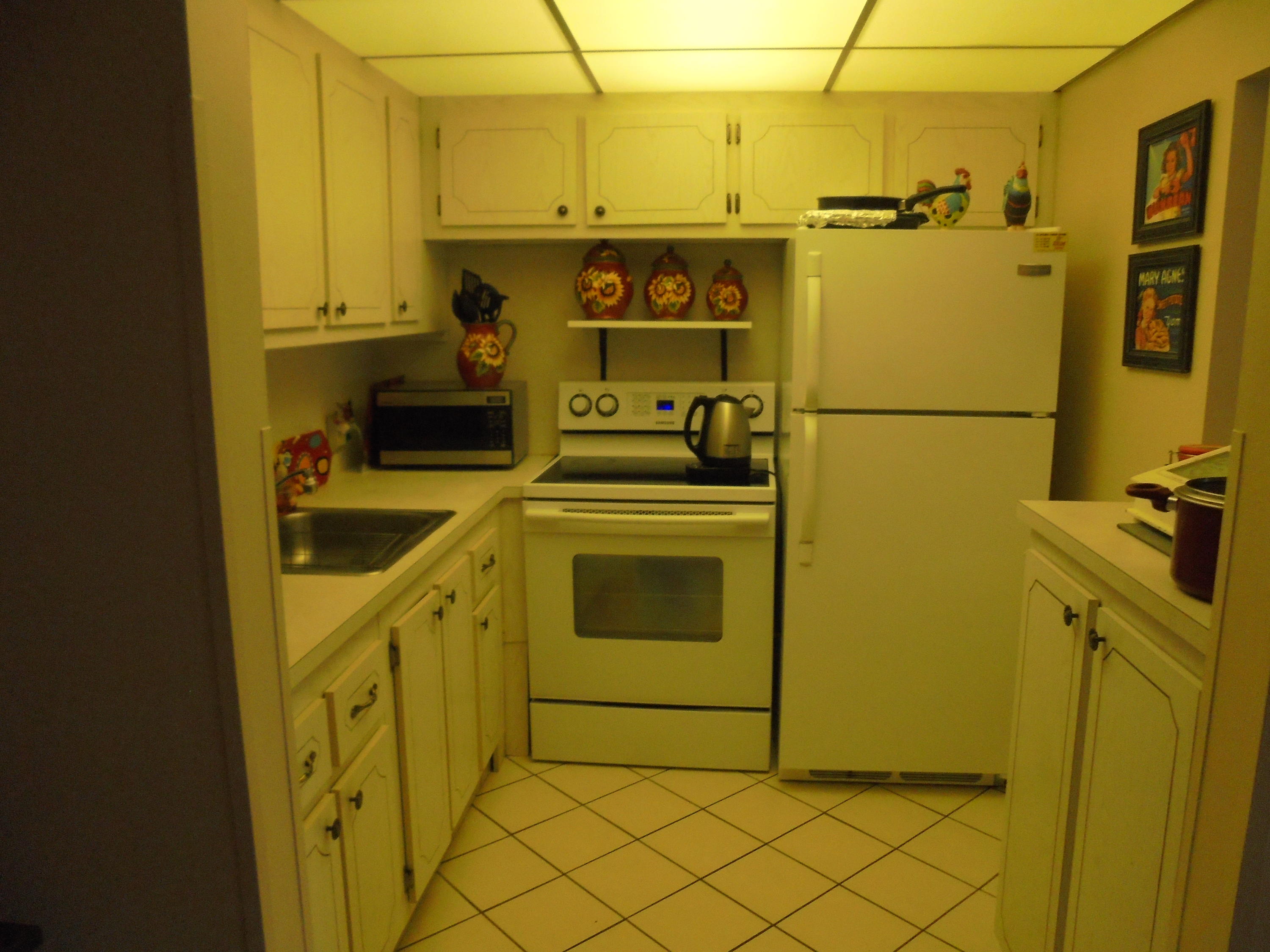 432 Mansfield K Boca Raton, FL 33434 - Photo 3 of 15 a utility room with cabinets