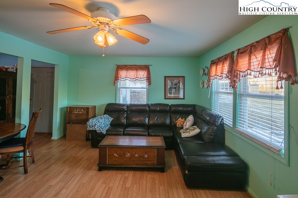 578 Charlie Hicks Road Banner Elk, NC 28604 - Photo 5 of 19 a living room with furniture and a fireplace
