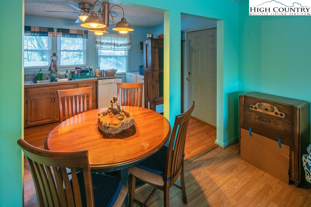 578 Charlie Hicks Road Banner Elk, NC 28604 - Photo 7 of 19 a dining room with furniture and window