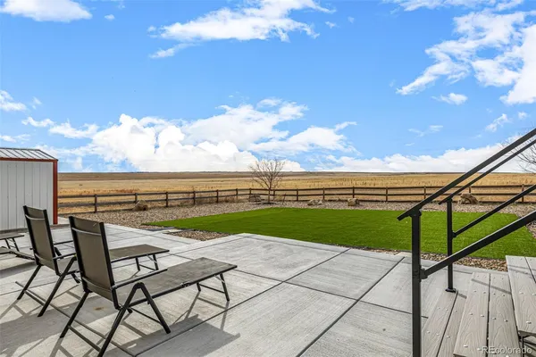 a view of a house with a patio
