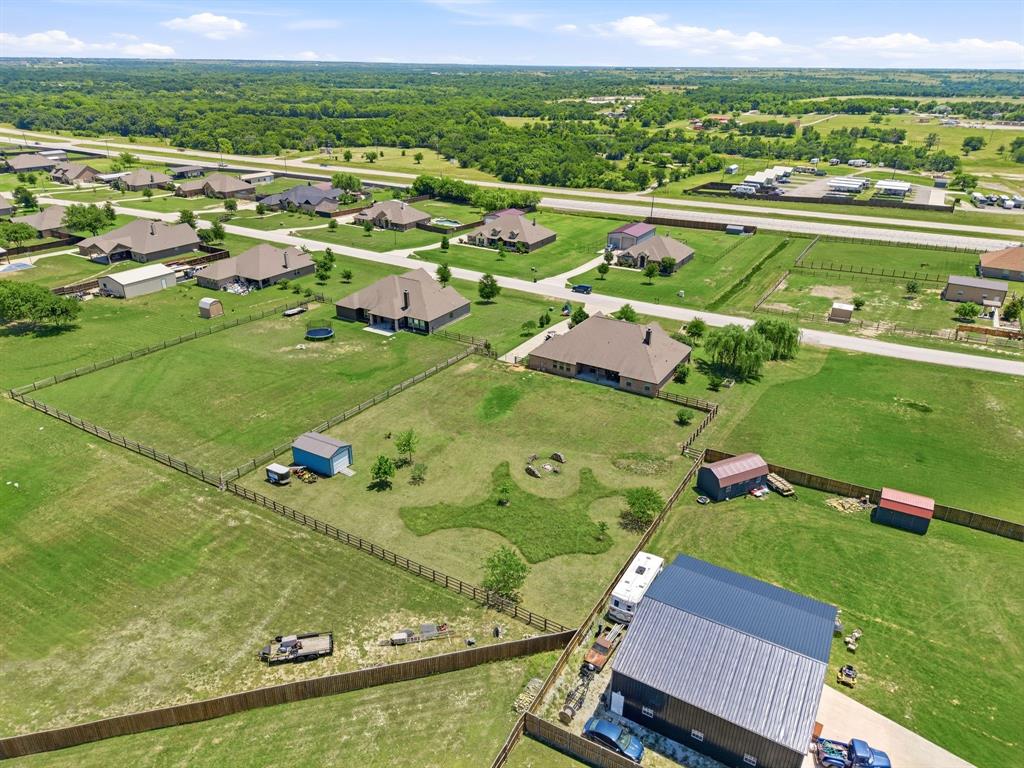 140 Heather Lane Decatur, TX 76234 - Photo 35 of 39 an aerial view of a houses with a yard