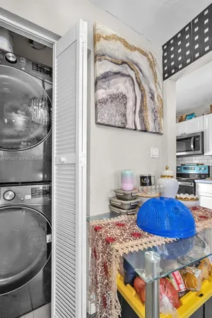 a kitchen with stainless steel appliances granite countertop a stove and a sink