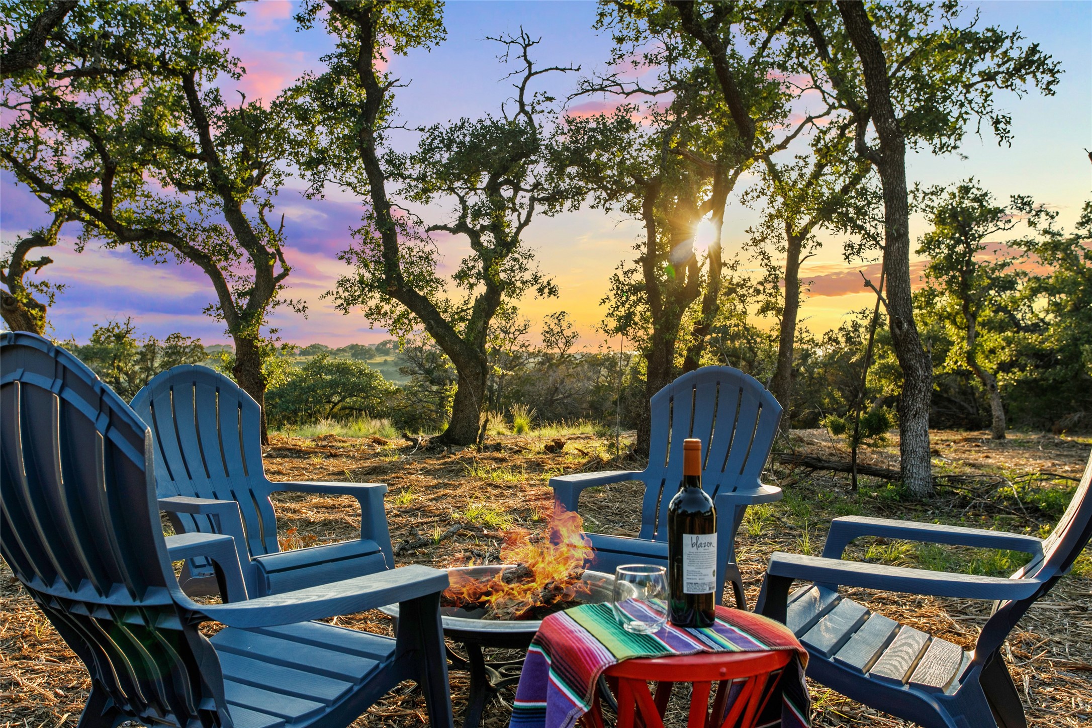 Lot 1 Sunset View Johnson City, TX 78636 - Photo 12 of 17 a view of a chairs and table in patio