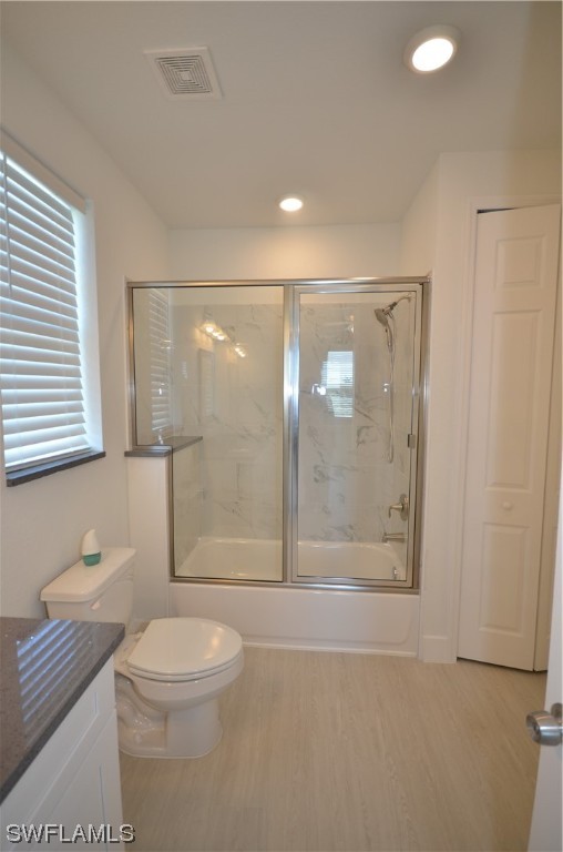 8581 Agate Street Port Charlotte, FL 33981 - Photo 26 of 50 a bathroom with a toilet a sink and shower