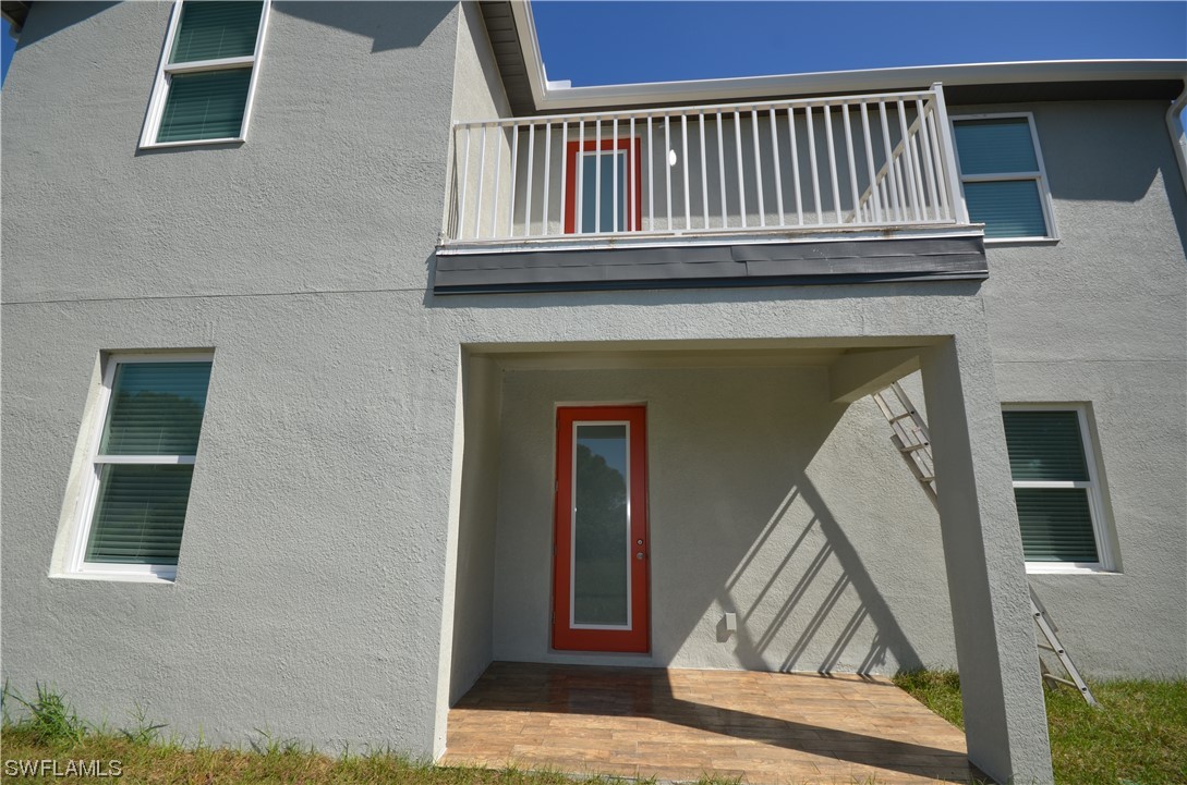 8581 Agate Street Port Charlotte, FL 33981 - Photo 41 of 50 a view of front door of a house