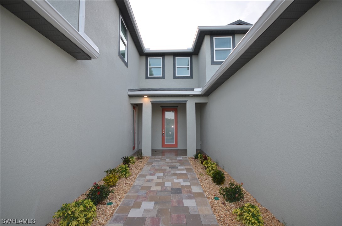 8581 Agate Street Port Charlotte, FL 33981 - Photo 43 of 50 a front view of a house