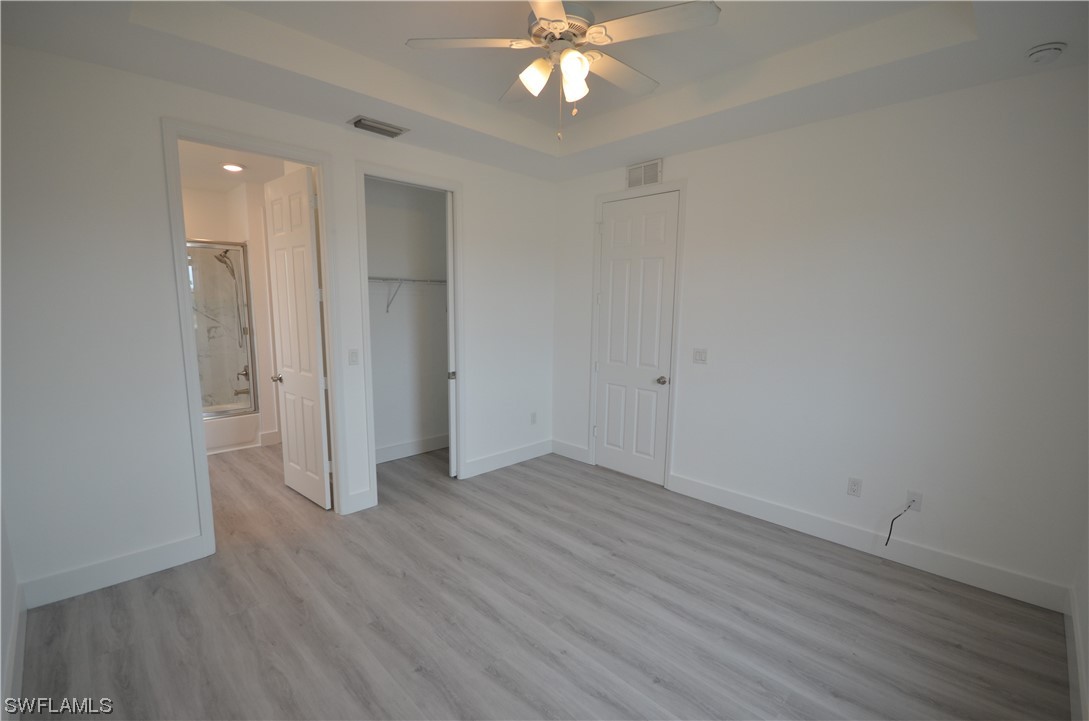 8581 Agate Street Port Charlotte, FL 33981 - Photo 48 of 50 a view of an empty room with wooden floor