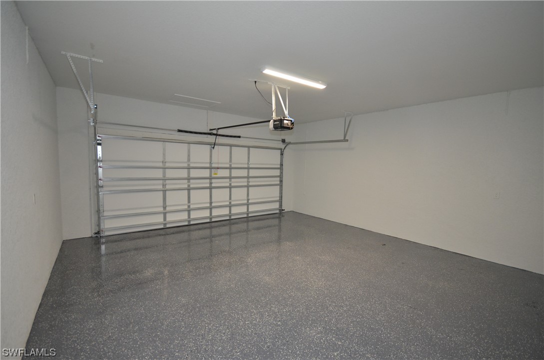 8581 Agate Street Port Charlotte, FL 33981 - Photo 7 of 50 a view of a garage