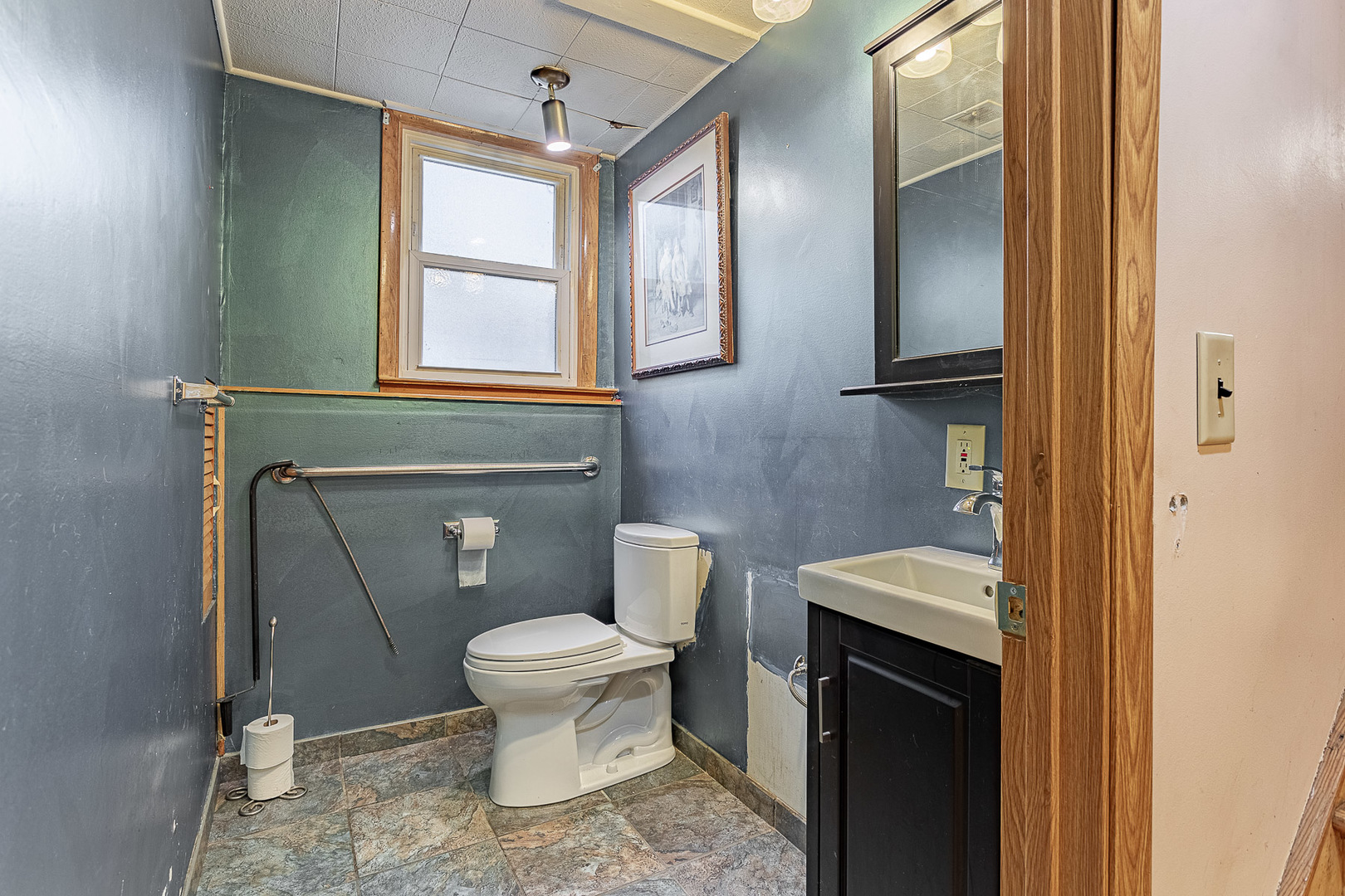 1506 West Palm Drive Mount Prospect, IL 60056 - Photo 13 of 19 a bathroom with a toilet and a sink