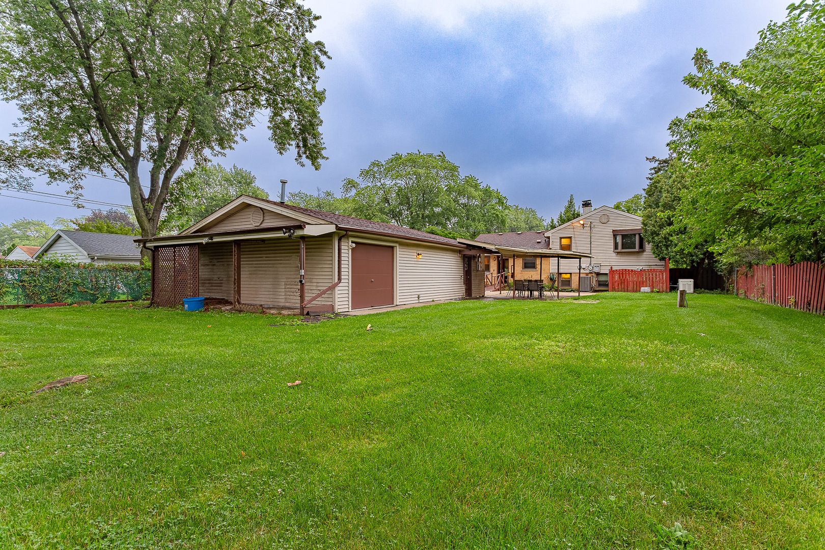 1506 West Palm Drive Mount Prospect, IL 60056 - Photo 17 of 19 a front view of house with yard and green space