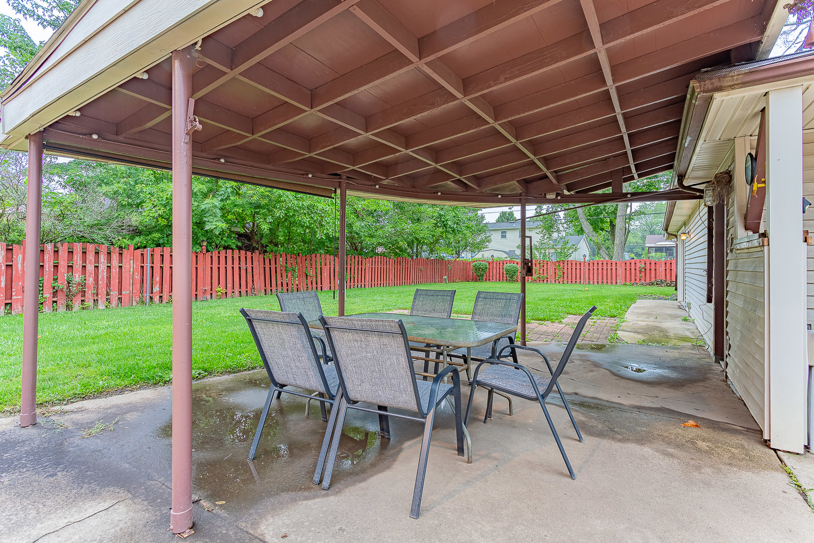 1506 West Palm Drive Mount Prospect, IL 60056 - Photo 18 of 19 a patio with a table and chairs