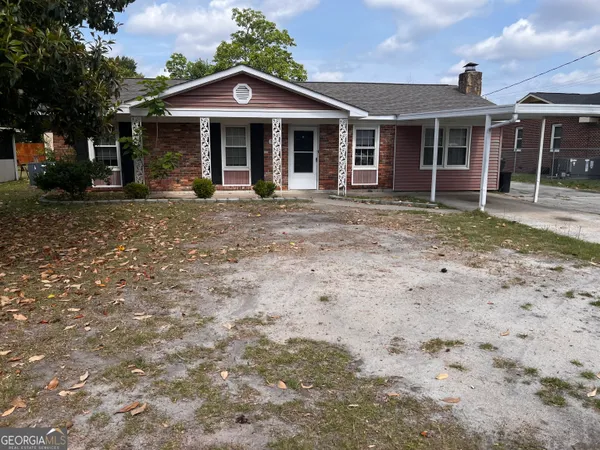 a front view of a house with a porch