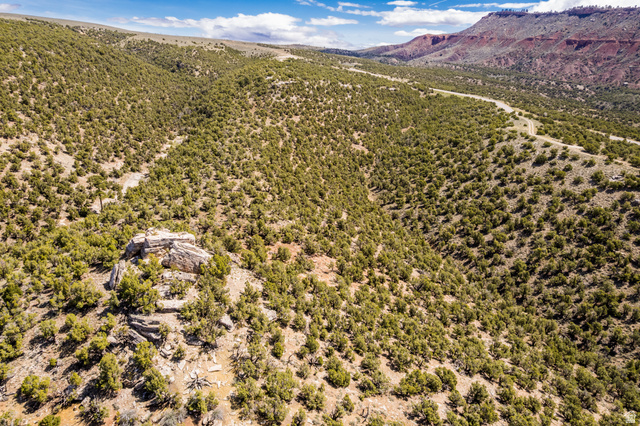 2650 Taylor Mountain Road, Unit REMARK Vernal, UT 84078 - Photo 7 of 7 Expansive terrain featuring natural rock formations and a diverse collection of trees and brush
