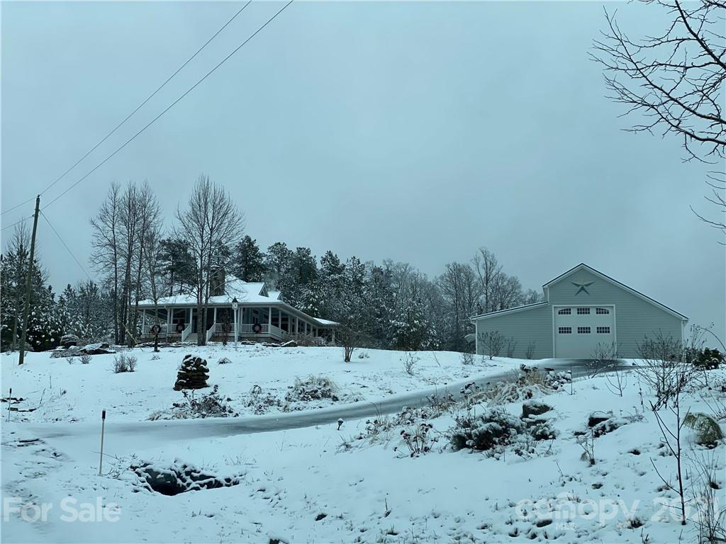 94 Pilot Ridge Road, Unit 22 Nebo, NC 28761 - Photo 22 of 32 a view of a covered with snow in the background