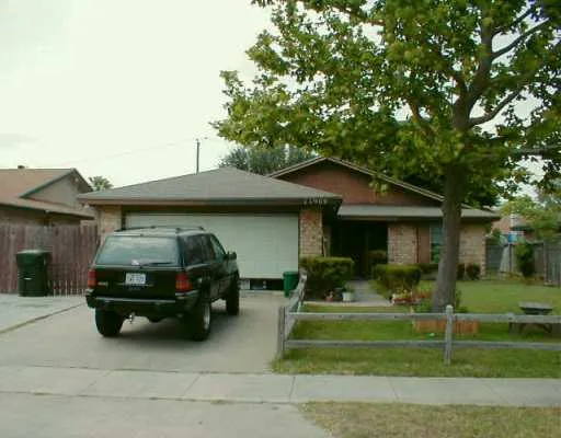 a car parked in front of a house