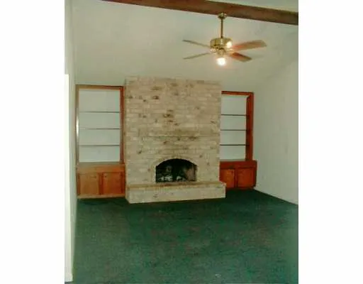 a living room with a fireplace