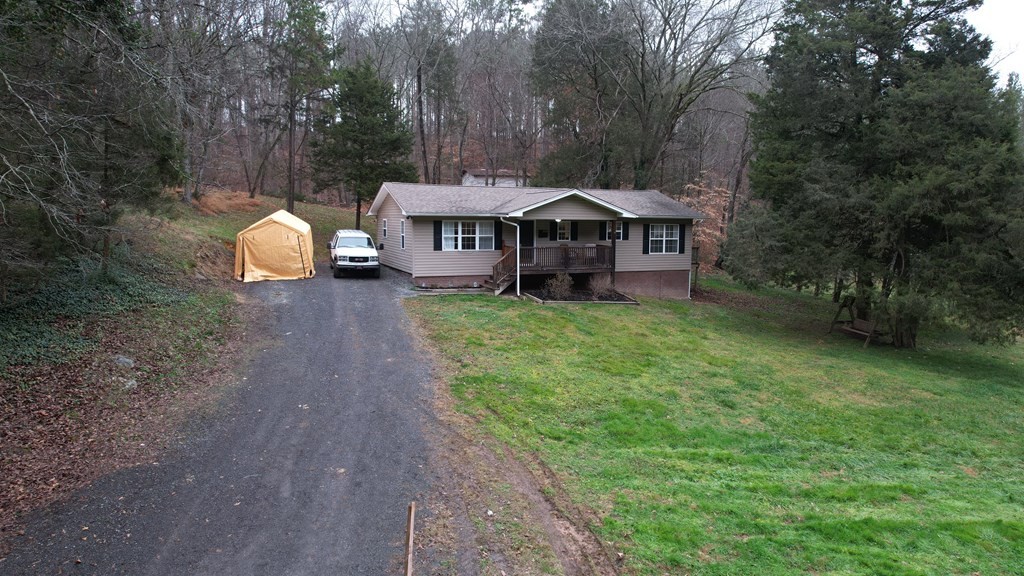 2050 Old River Road Charleston, TN 37310 - Photo 56 of 64 a view of a house with a backyard