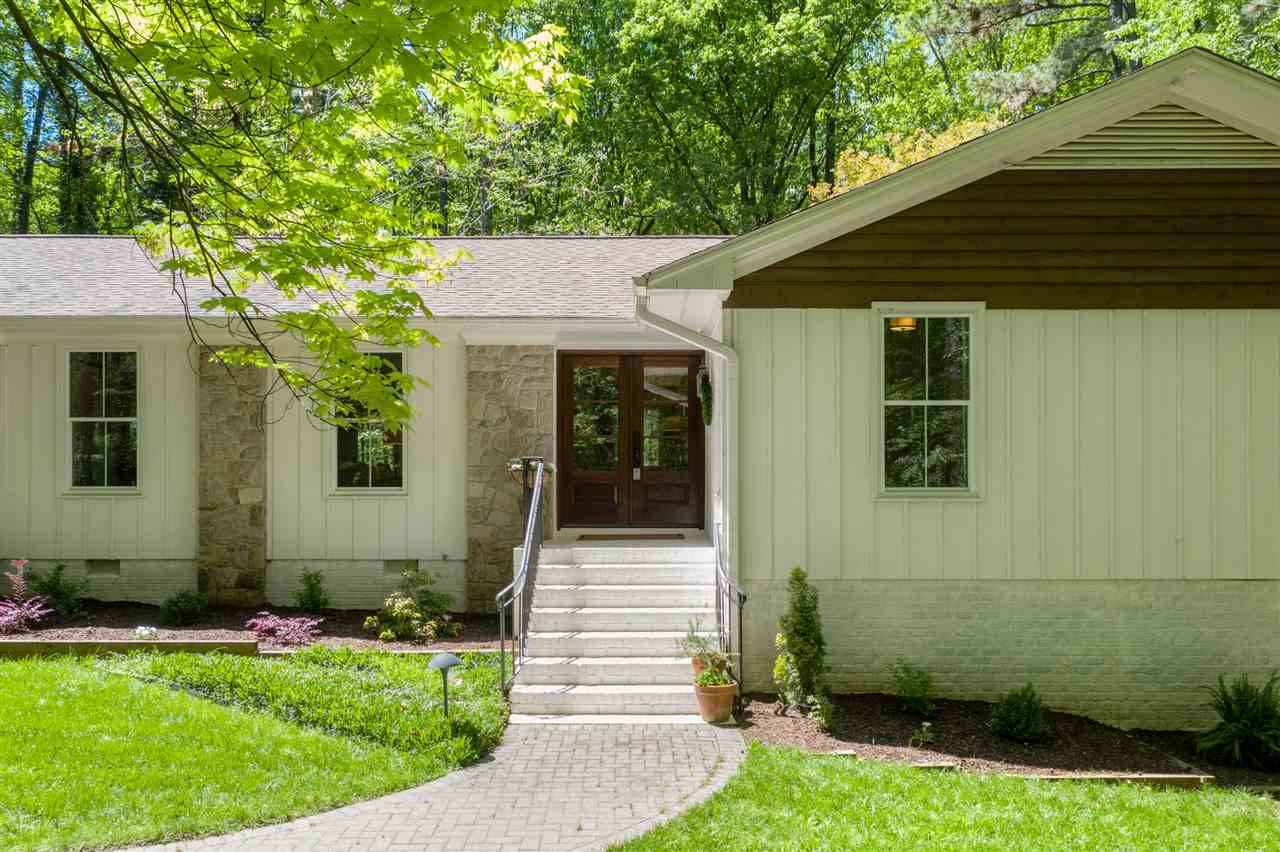 9421 Barton Creek Road Raleigh, NC 27615 - Photo 19 of 30 a front view of a house with a yard