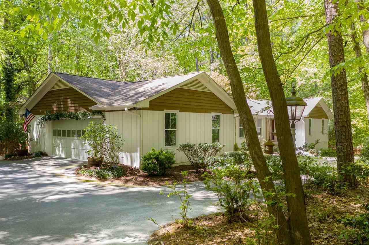 9421 Barton Creek Road Raleigh, NC 27615 - Photo 21 of 30 a front view of a house with garden