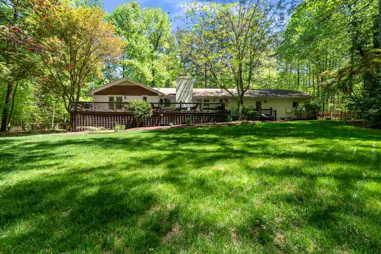 9421 Barton Creek Road Raleigh, NC 27615 - Photo 22 of 30 a view of a house with backyard and sitting area