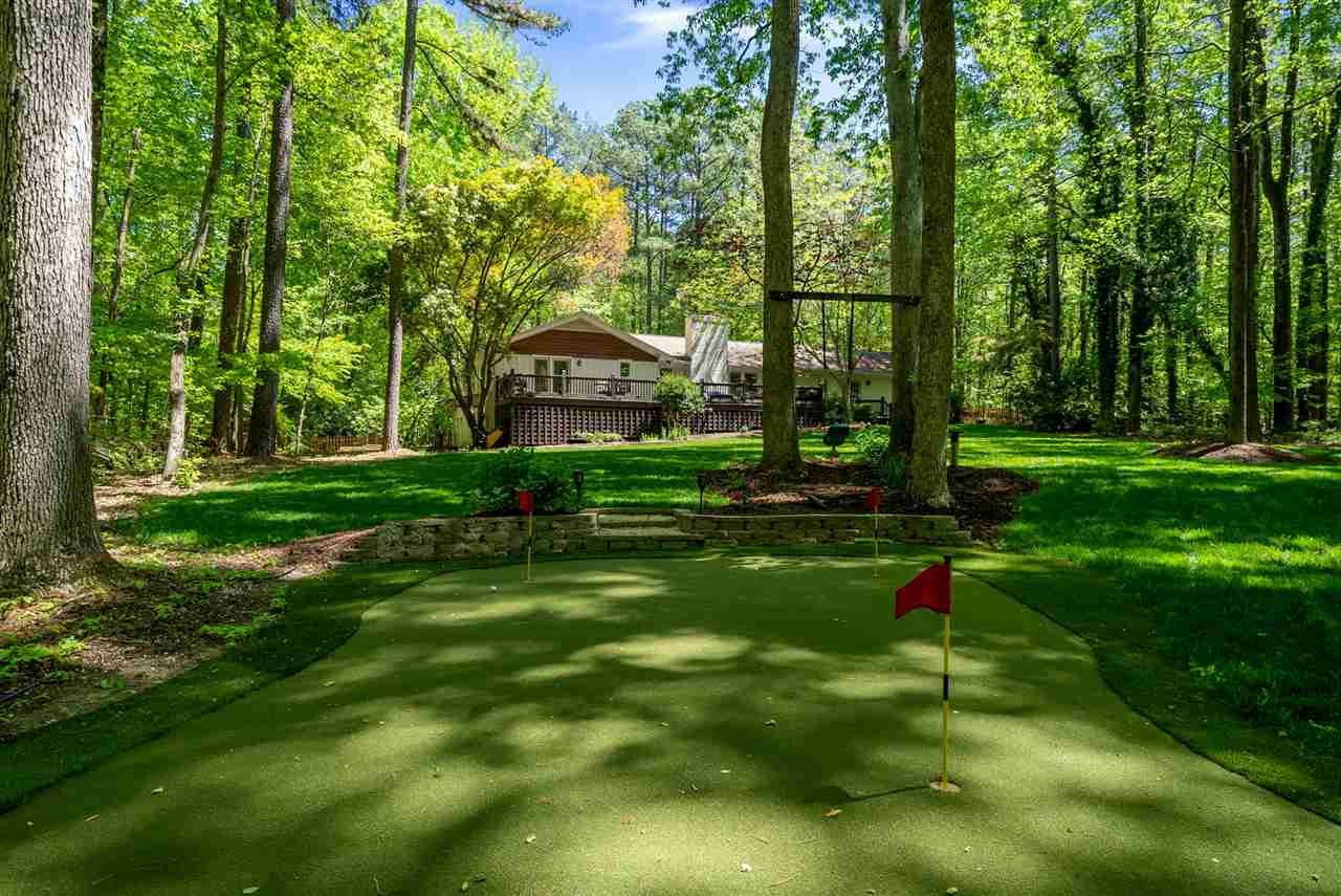 9421 Barton Creek Road Raleigh, NC 27615 - Photo 26 of 30 a view of a park with large trees