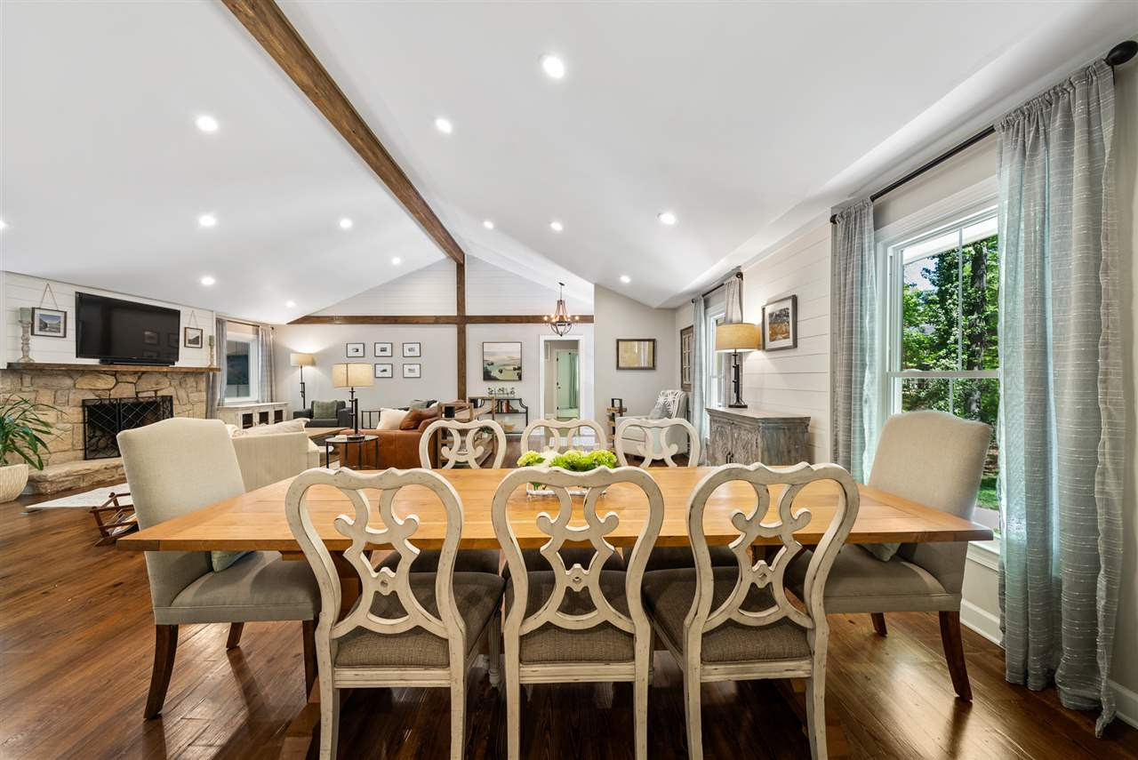 9421 Barton Creek Road Raleigh, NC 27615 - Photo 5 of 30 a view of a dining room with furniture window and wooden floor