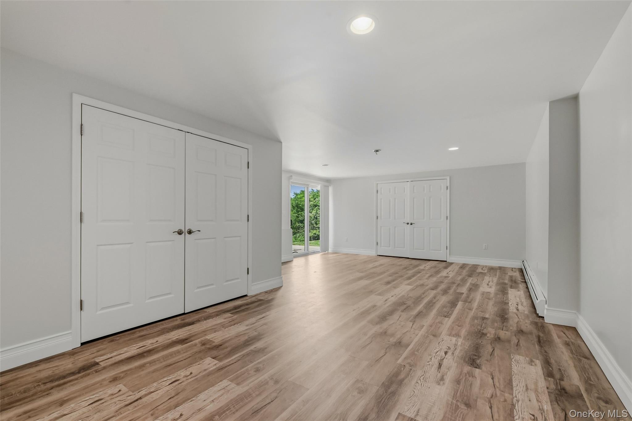 51 Meriwether Trail Congers, NY 10920 - Photo 41 of 50 Spacious room featuring wood-finish flooring, neutral walls, and white trim