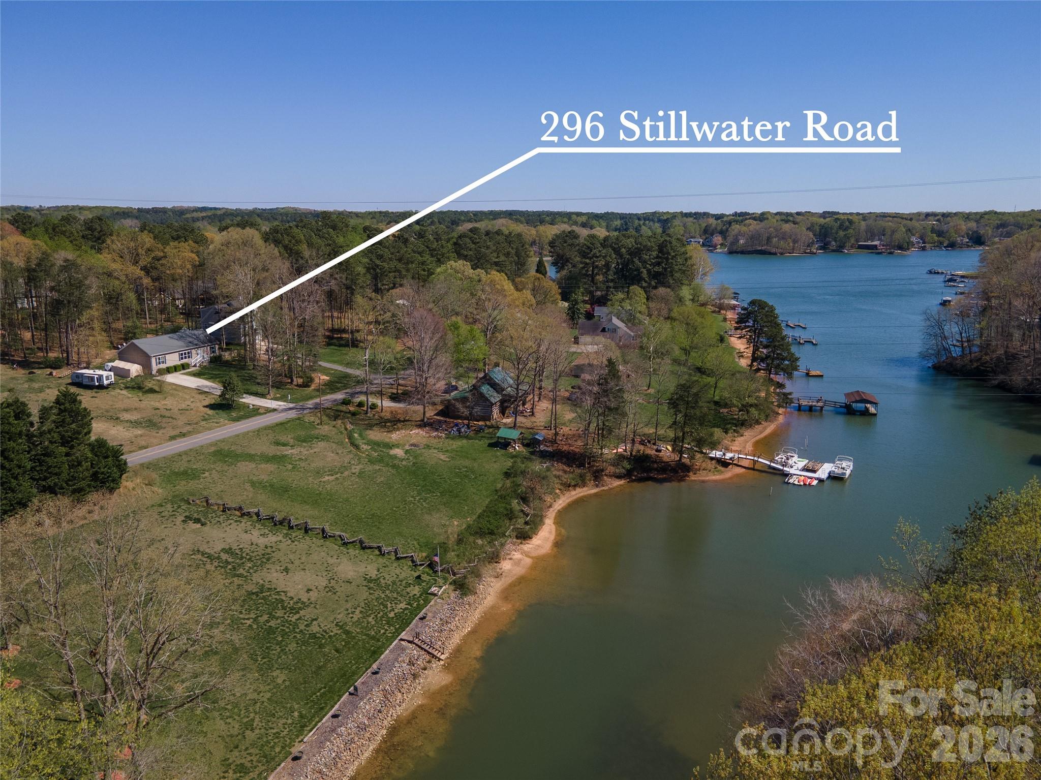296 Stillwater Road Troutman, NC 28166 - Photo 5 of 33 a view of a street with an ocean view