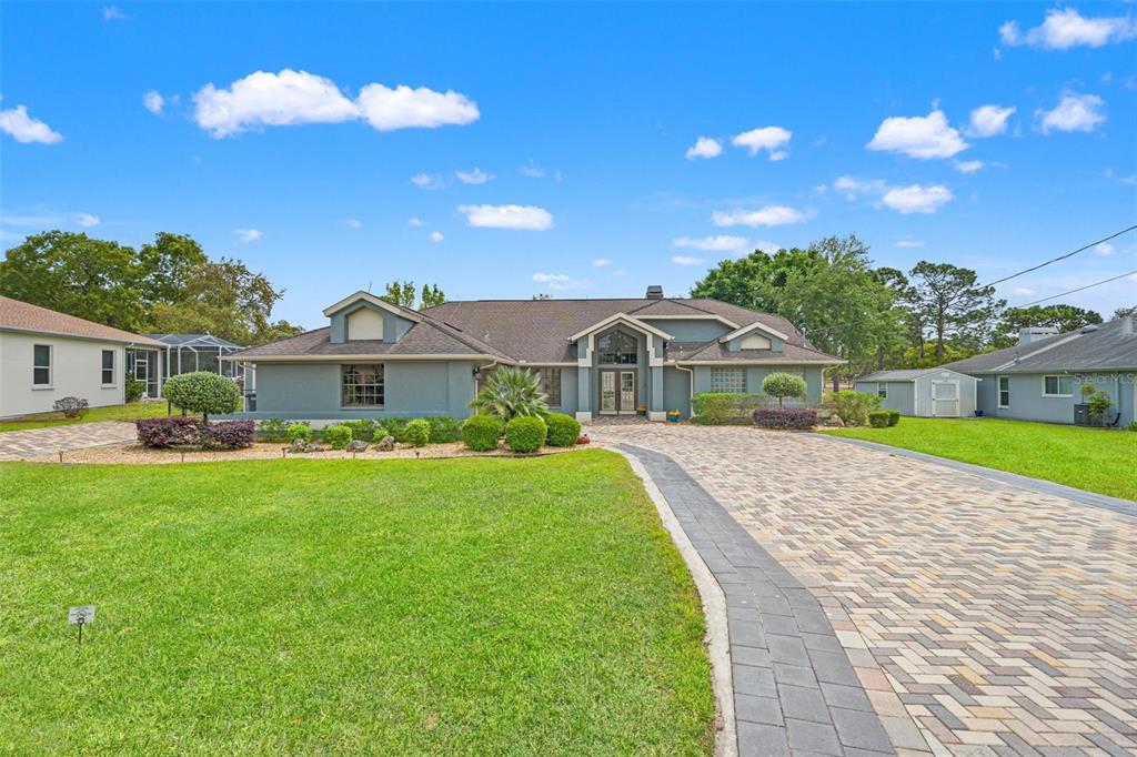5052 Florentine Court Spring Hill, FL 34608 - Photo 2 of 58