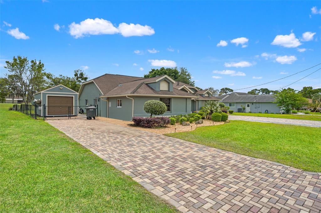 5052 Florentine Court Spring Hill, FL 34608 - Photo 3 of 58