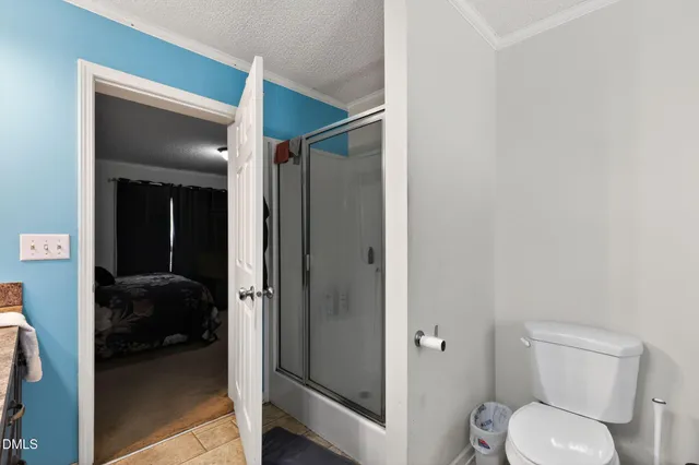 a en suite bathroom with a toilet