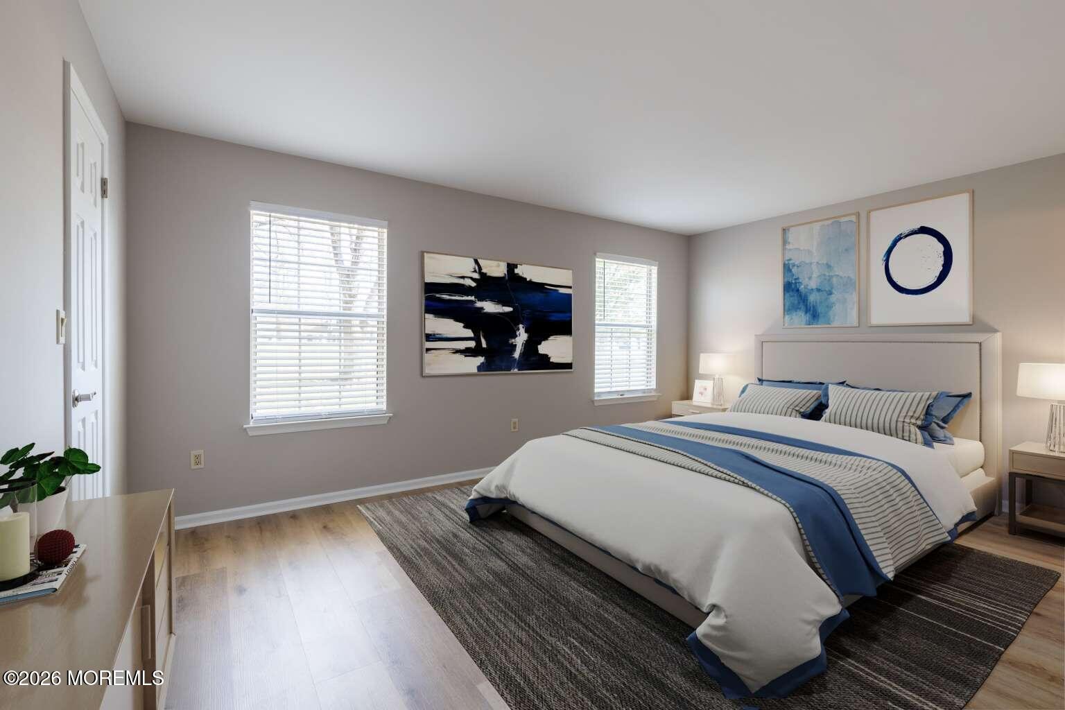 43 Poplar Place Freehold, NJ 07728 - Photo 16 of 31 a bedroom with a bed and a window