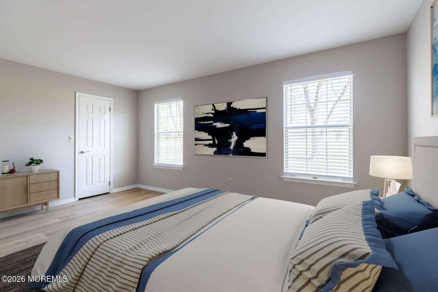 43 Poplar Place Freehold, NJ 07728 - Photo 18 of 31 a bedroom with a bed and a window