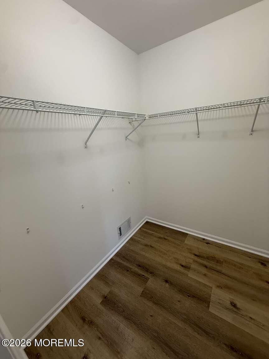 43 Poplar Place Freehold, NJ 07728 - Photo 21 of 31 a view of a room with racks on the wall