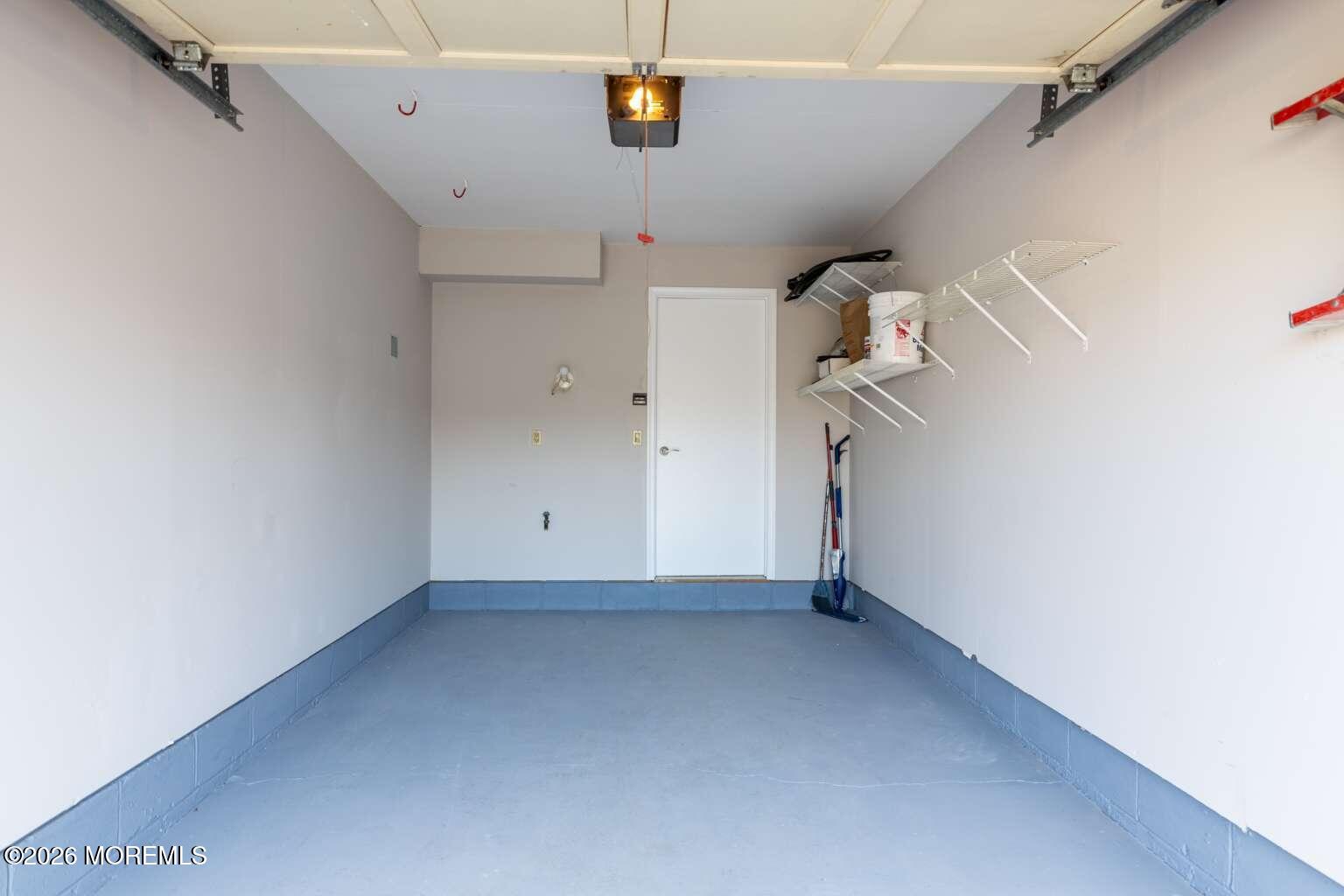 43 Poplar Place Freehold, NJ 07728 - Photo 24 of 31 a view of a hallway with a window