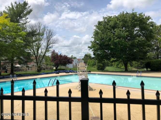 43 Poplar Place Freehold, NJ 07728 - Photo 30 of 31 a view of swimming pool with an outdoor seating