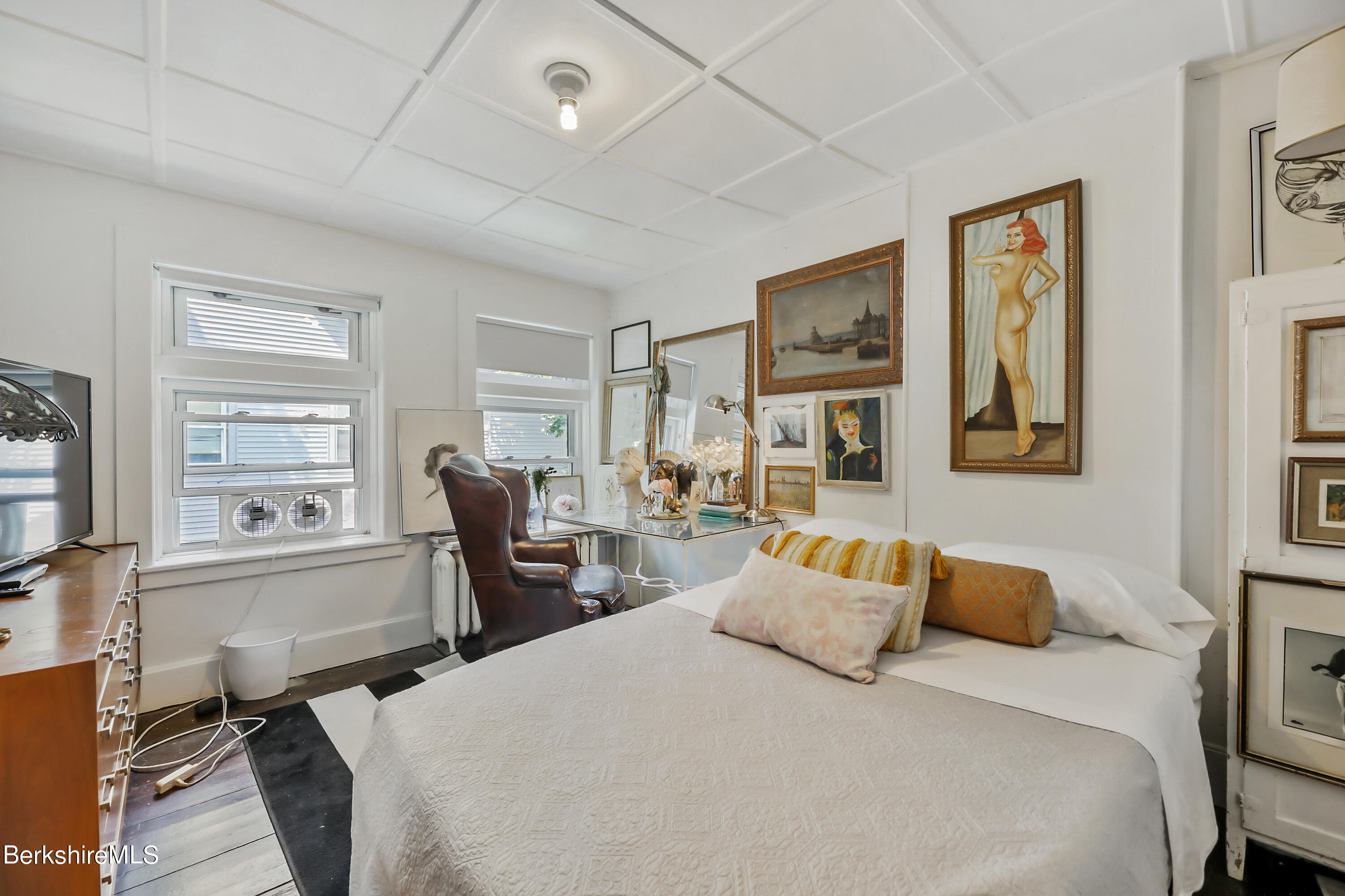 7 Lincoln Street Pittsfield, MA 01201 - Photo 18 of 25 a bedroom with a bed and wooden floor